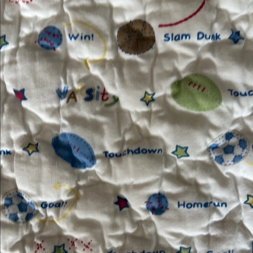 Varsity Baby Quilt with Red and Yellow Accents. Home quilted